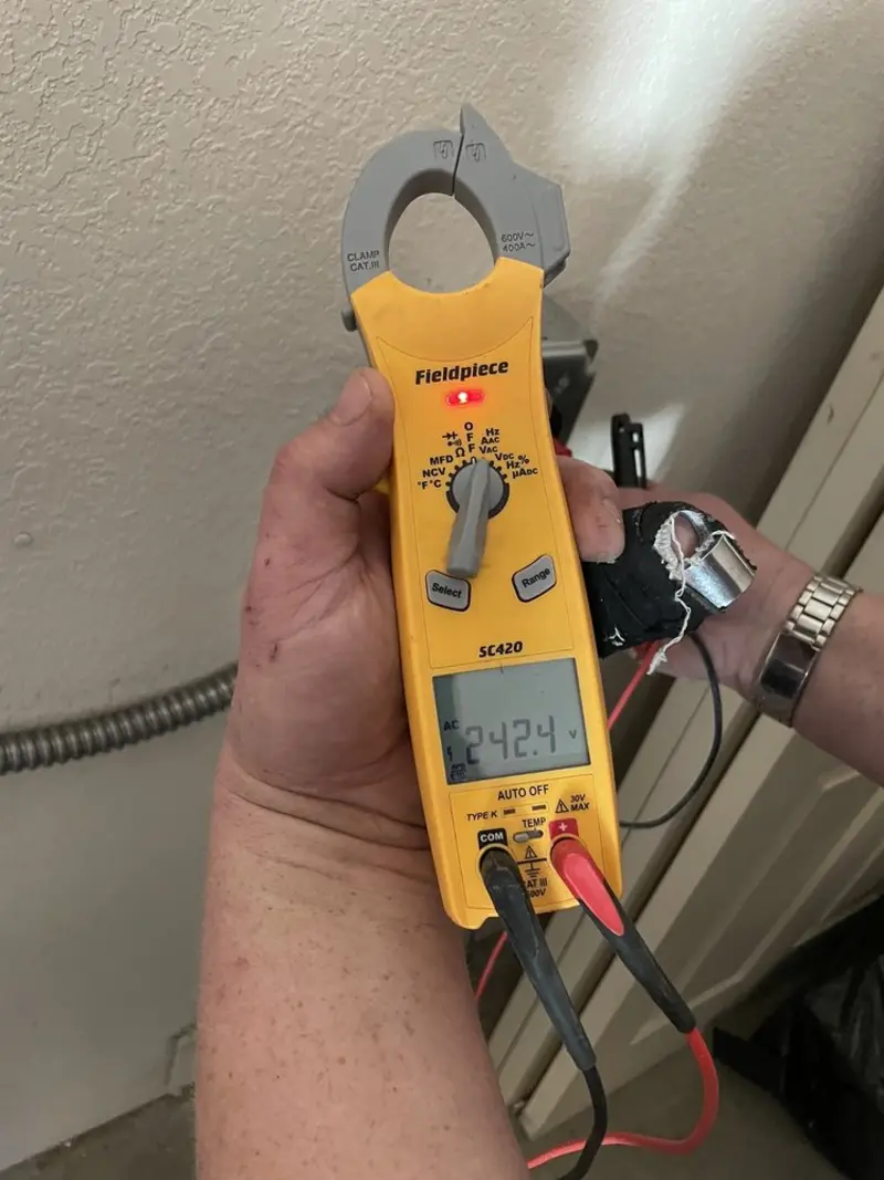 Voltage testing with clamp meter during Hot Tub / Pool Electrical Wiring in Muscatine
